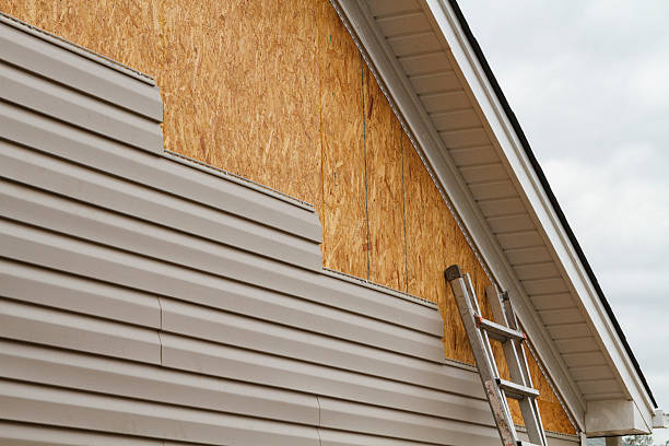 Professional Siding Contractor technician working in Henderson, MD